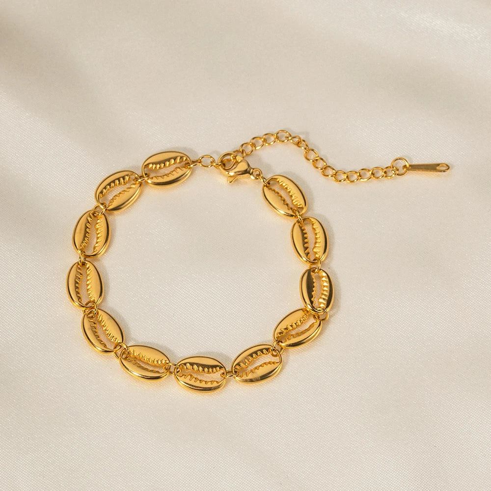 Pulseira Feminina Concha de Aço Banhado à Ouro 18k